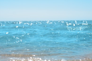 Photo of Beautiful sea under blue sky on sunny day, closeup