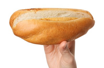 Woman with fresh hot dog bun on white background, closeup