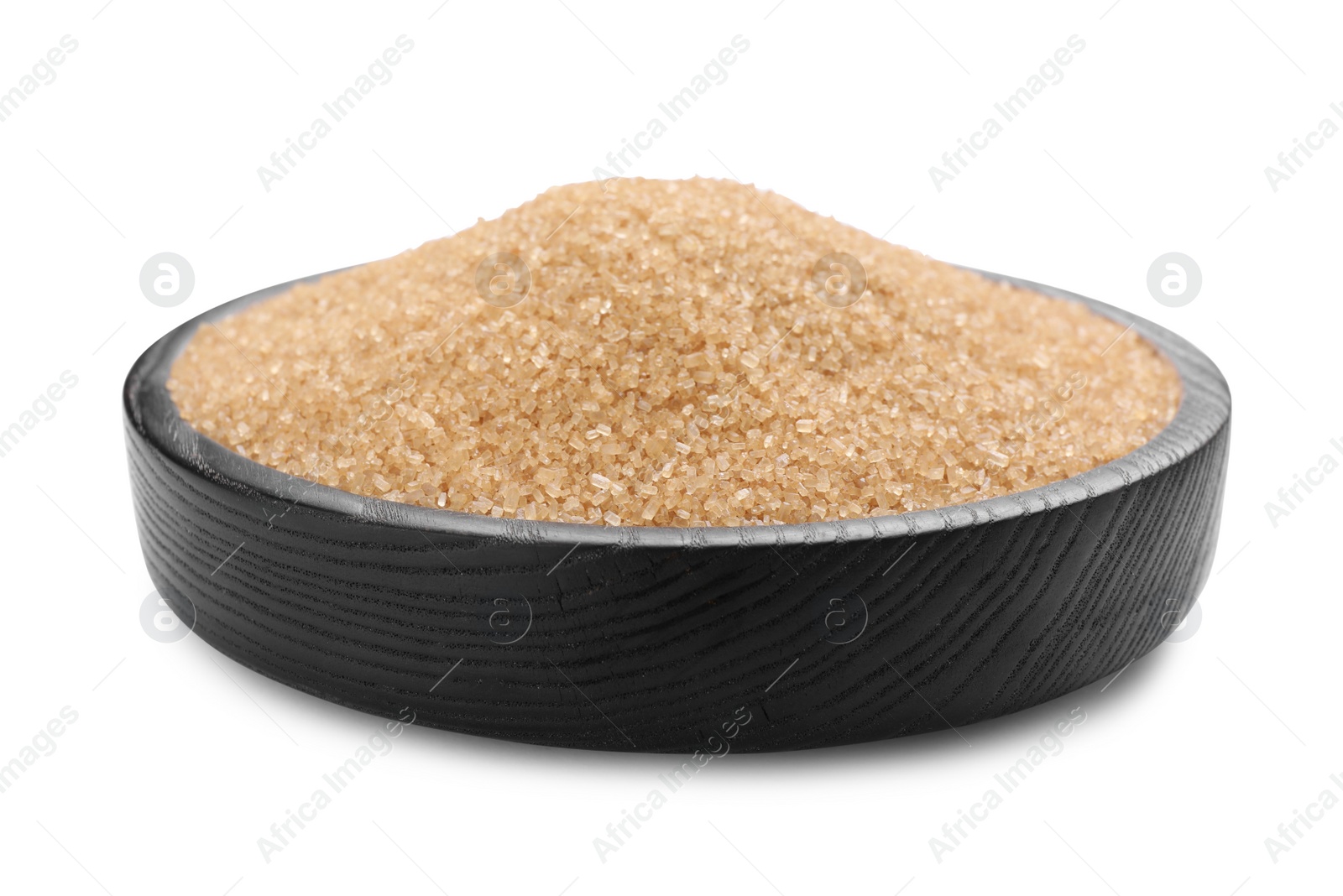 Photo of Black wooden plate with brown sugar isolated on white
