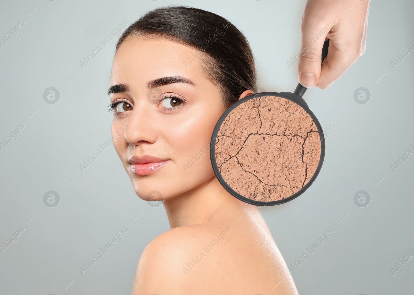 Image of Young woman with facial dry skin problem on light grey background