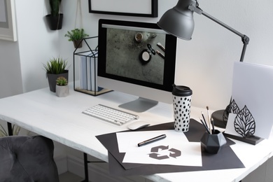 Photo of Stylish workplace with modern computer on desk