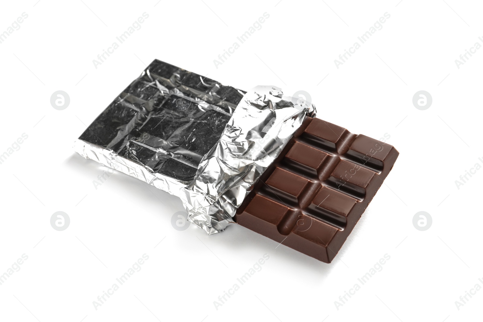 Photo of Tasty dark chocolate bar with foil on white background