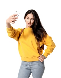 Photo of Attractive young woman taking selfie on white background