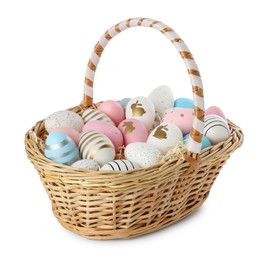 Photo of Easter basket with many painted eggs on white background