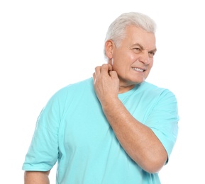 Photo of Mature man scratching neck on white background. Annoying itch