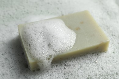 Photo of Closeup view of soap and fluffy foam