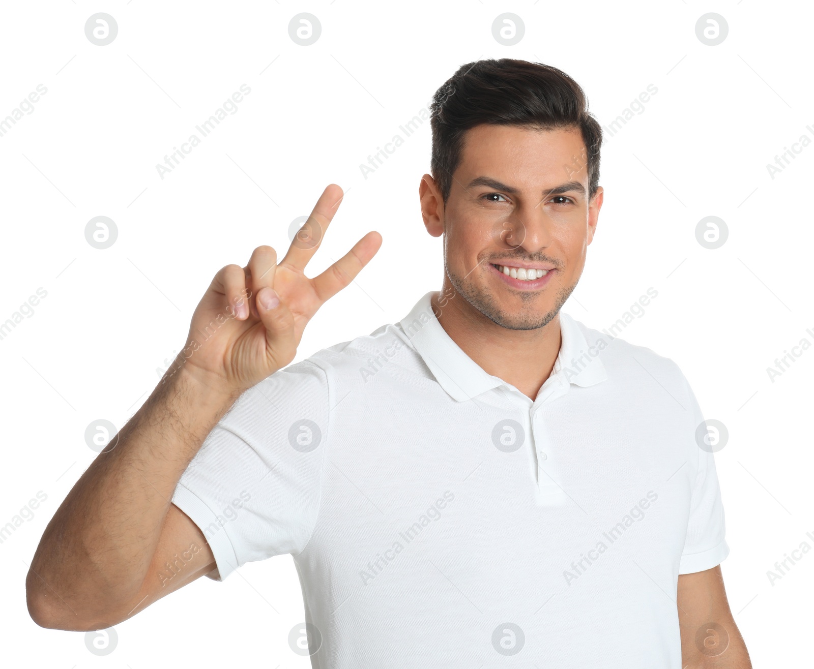 Photo of Man showing number two with his hand on white background