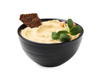 Bowl of delicious hummus with crispbread and chickpeas isolated on white