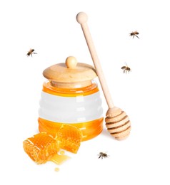 Image of Sweet honey in glass jar with blank label, honey dipper, pieces of honeycomb and flying bees on white background. Mockup for design