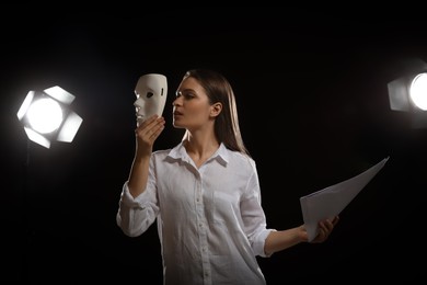 Photo of Professional actress rehearsing on stage in theatre