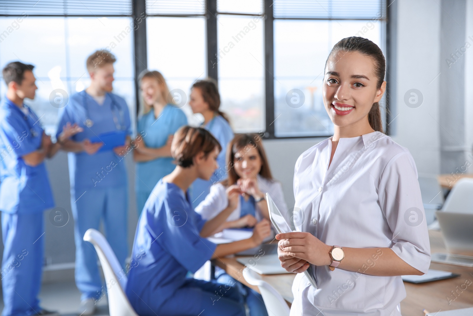 Photo of Smart medical student with her classmates in college