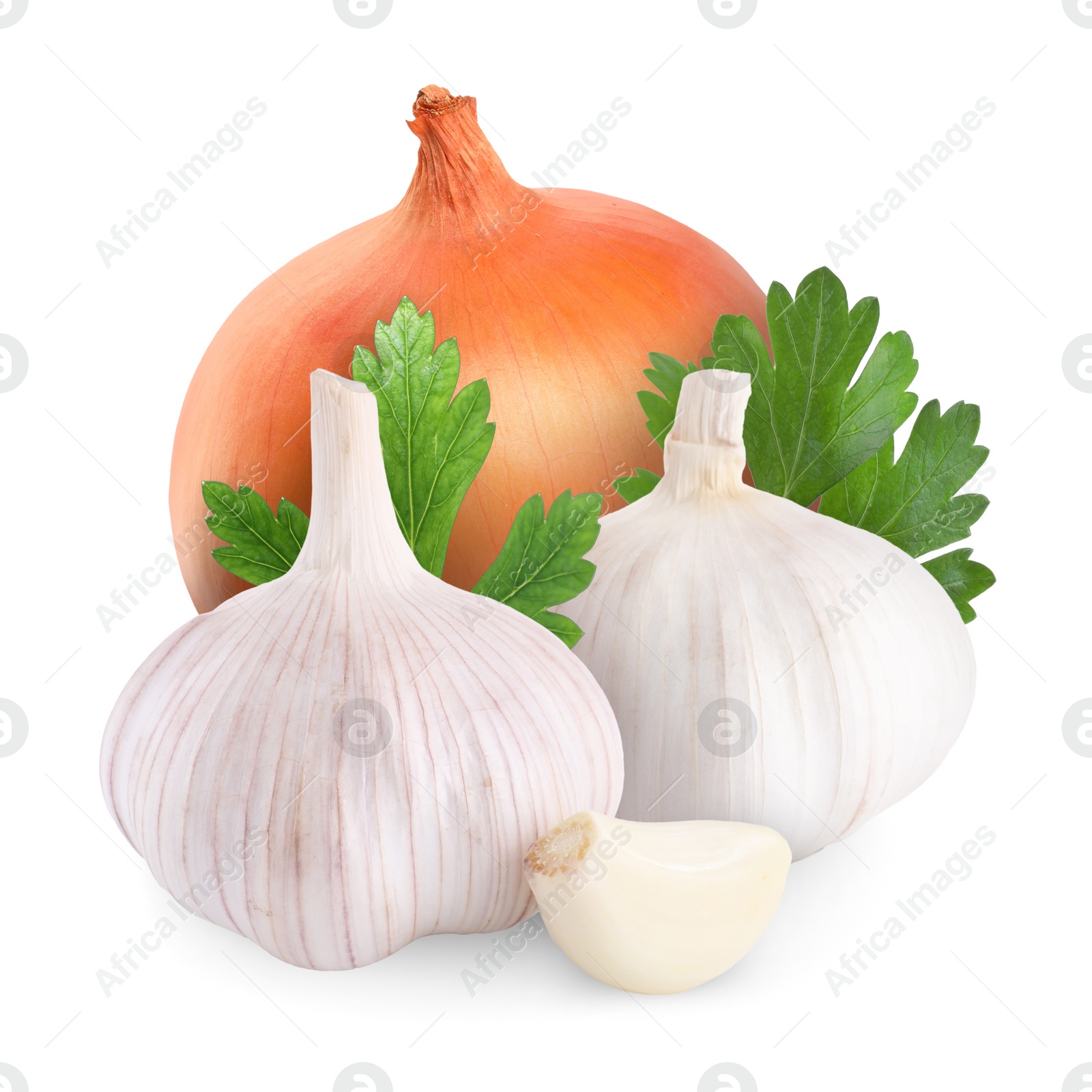 Image of Garlic, yellow onion and parsley isolated on white