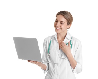 Photo of Female doctor using video chat on laptop against white background
