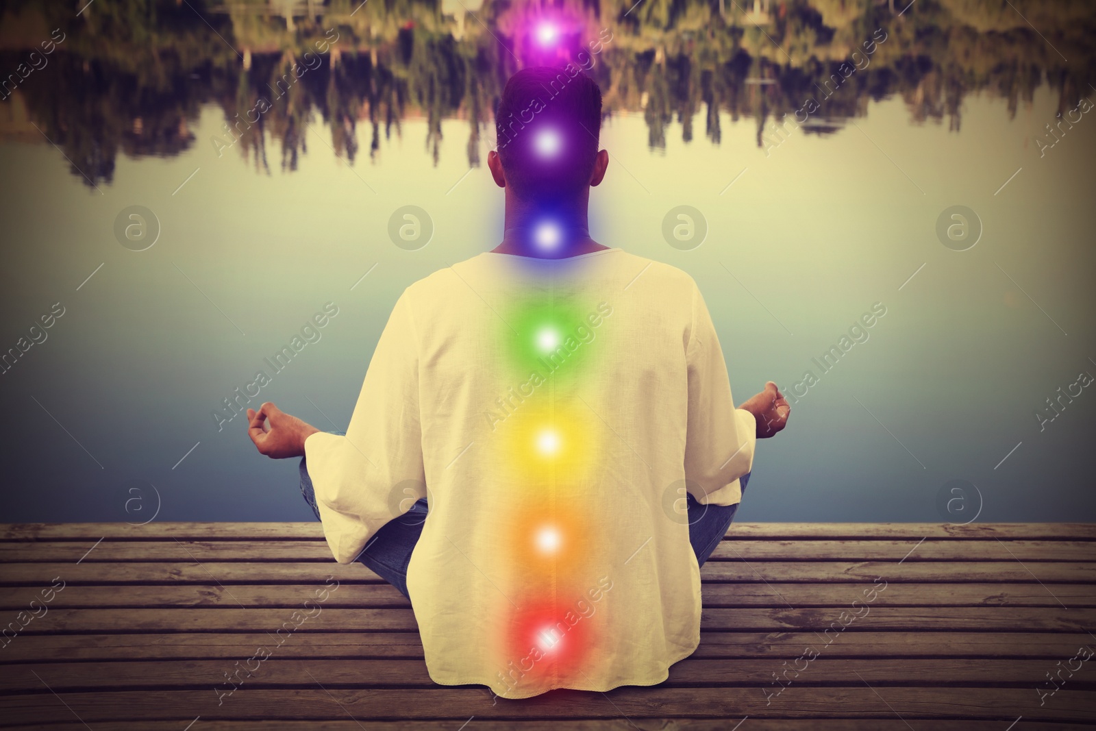 Image of Man meditating on wooden pier near river, back view. Scheme of seven chakras, illustration