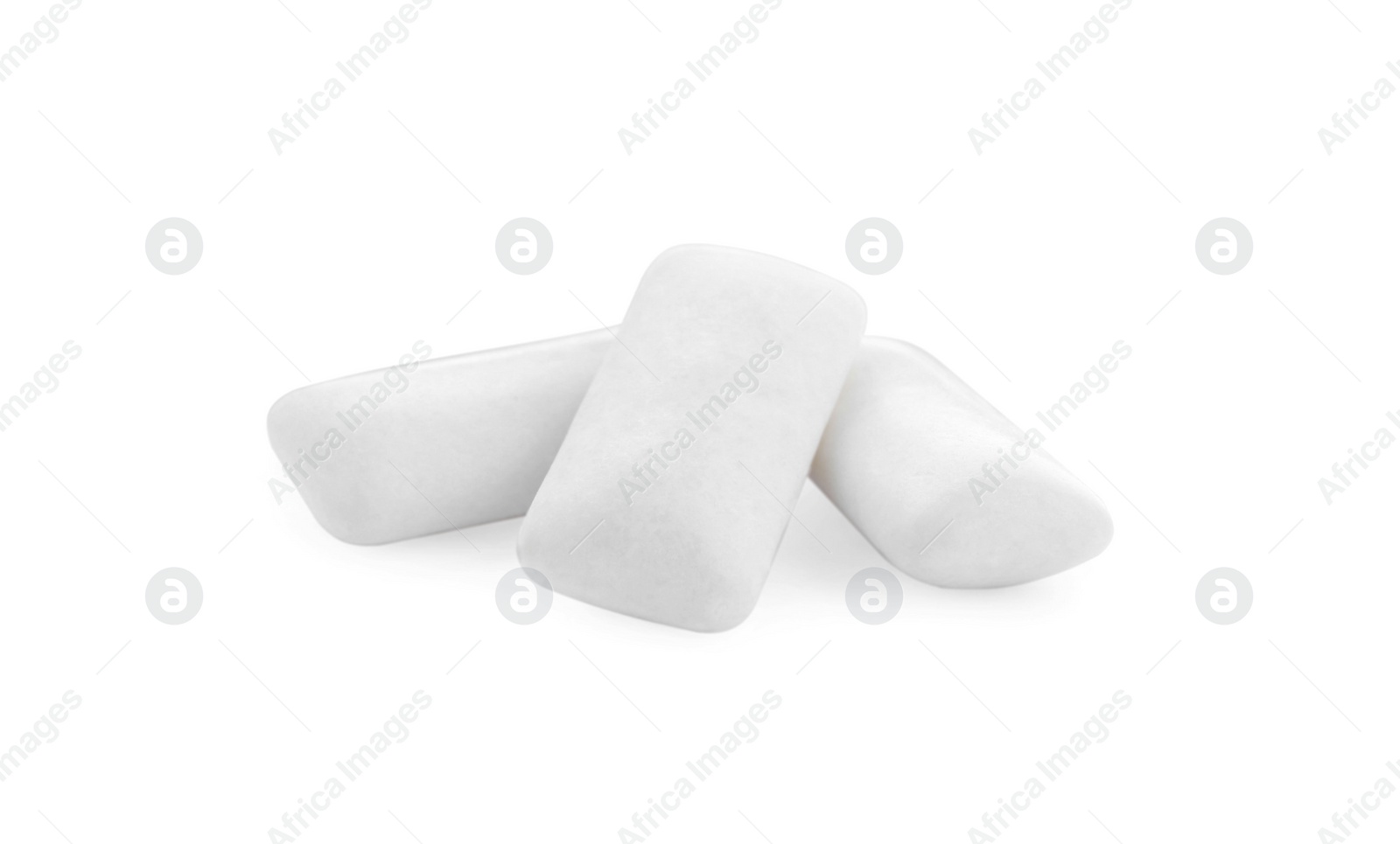 Photo of Three chewing gum pieces on white background