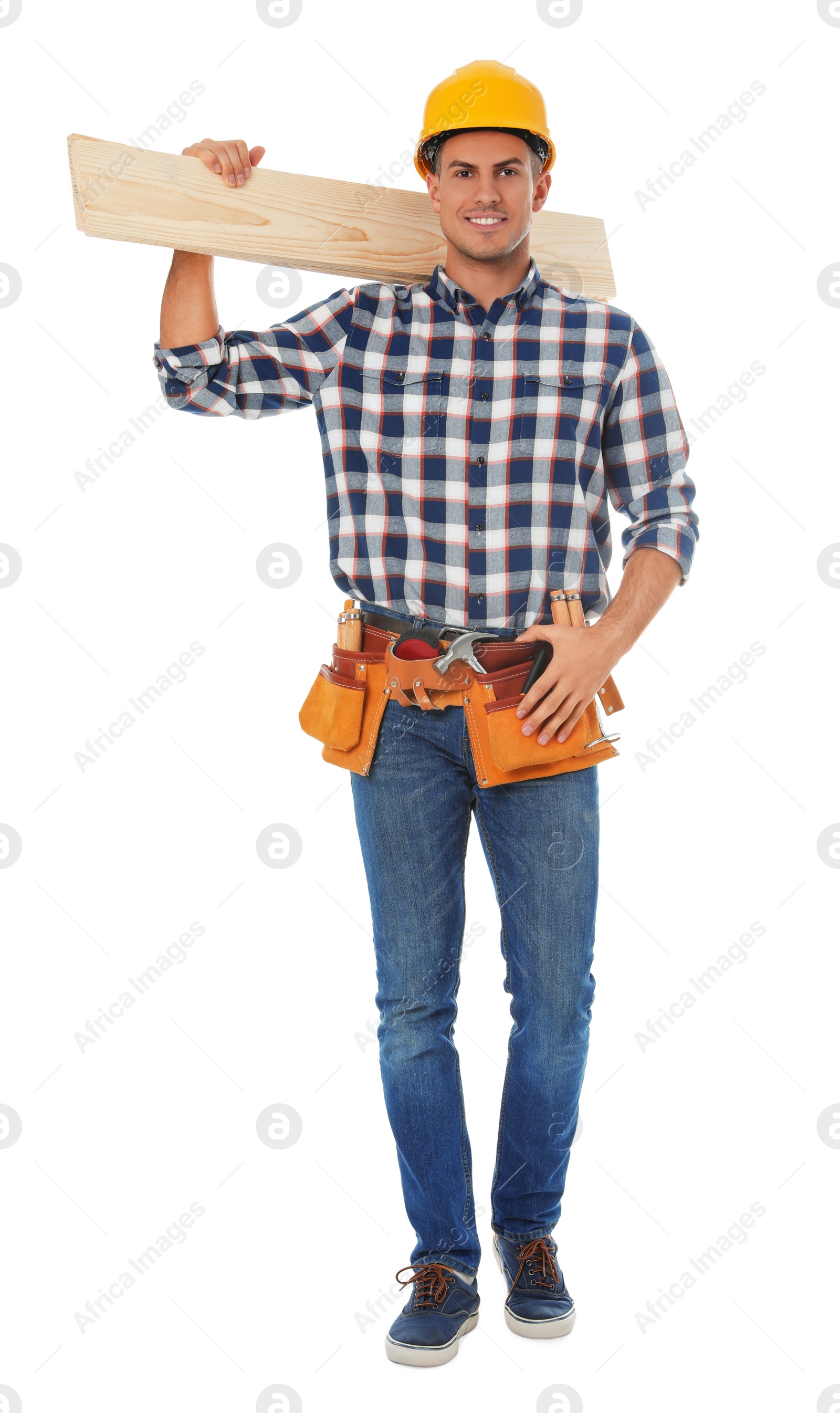 Photo of Handsome carpenter with wooden planks isolated on white