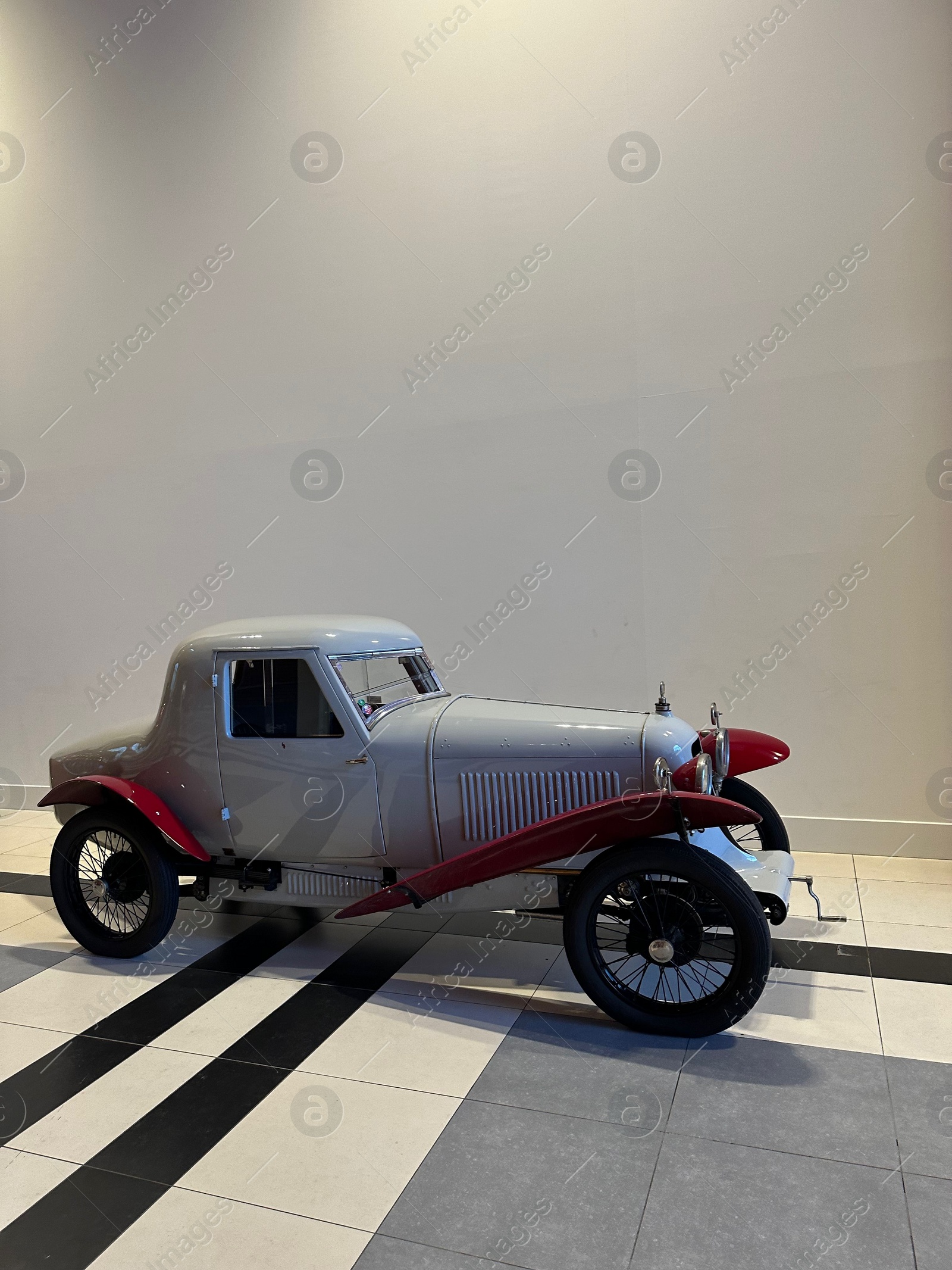 Photo of Hague, Netherlands - November 8, 2022: Beautiful view of white retro car in Louwman museum