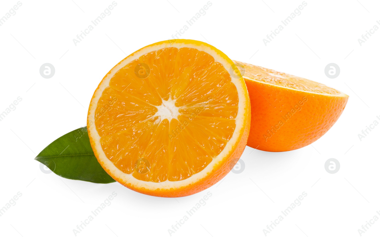 Photo of Halves of fresh ripe orange and green leaf isolated on white