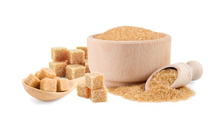 Image of Brown sugar cubes and granulated isolated on white