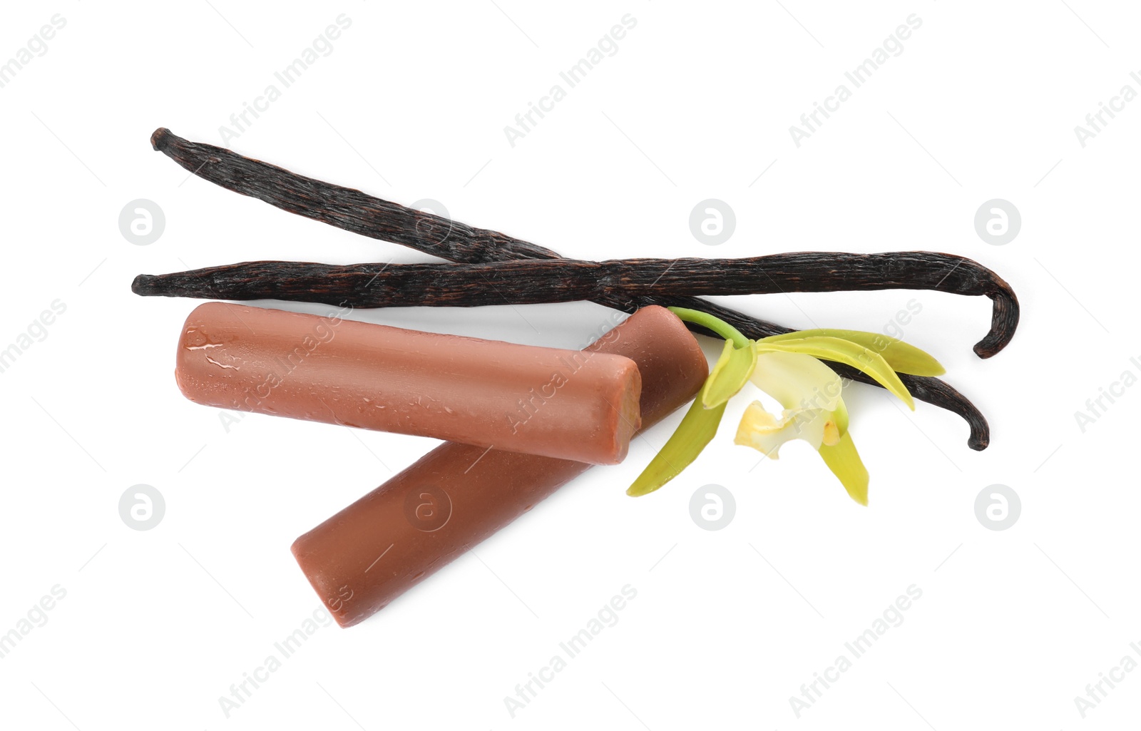 Photo of Glazed curd cheese bars, vanilla pods and flower isolated on white, top view