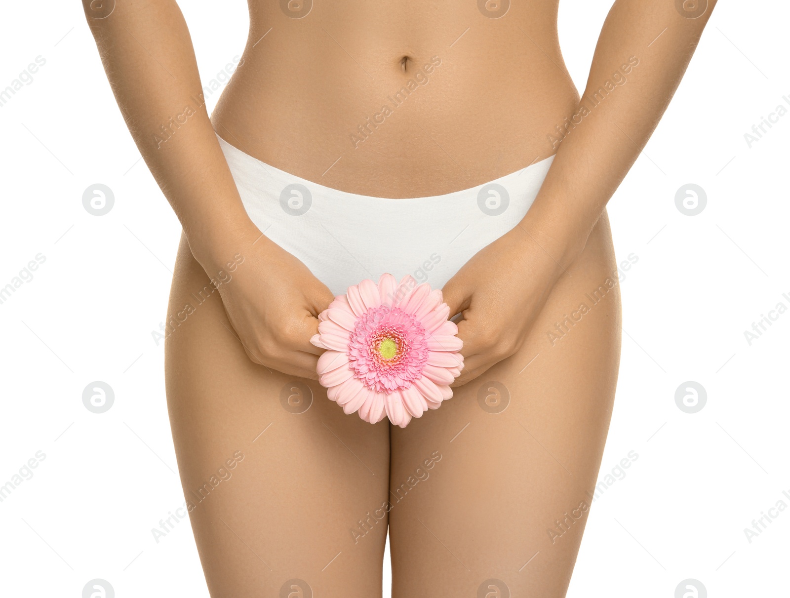 Photo of Gynecology. Woman in underwear with gerbera flower on white background, closeup