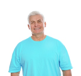 Photo of Portrait of mature man laughing on white background