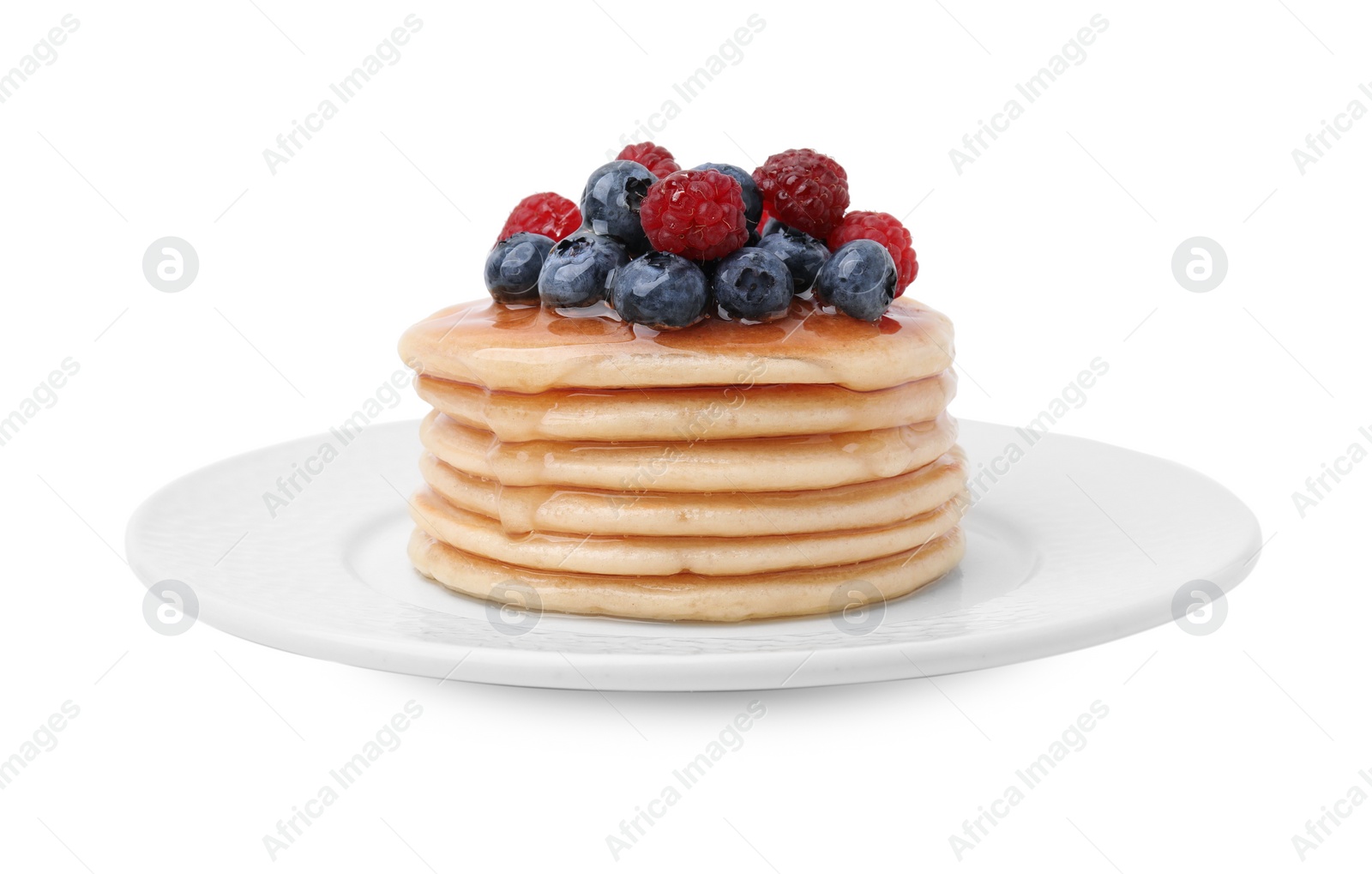 Photo of Delicious pancakes with berries and honey isolated on white