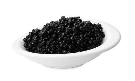 Photo of Ceramic bowl with black caviar on white background