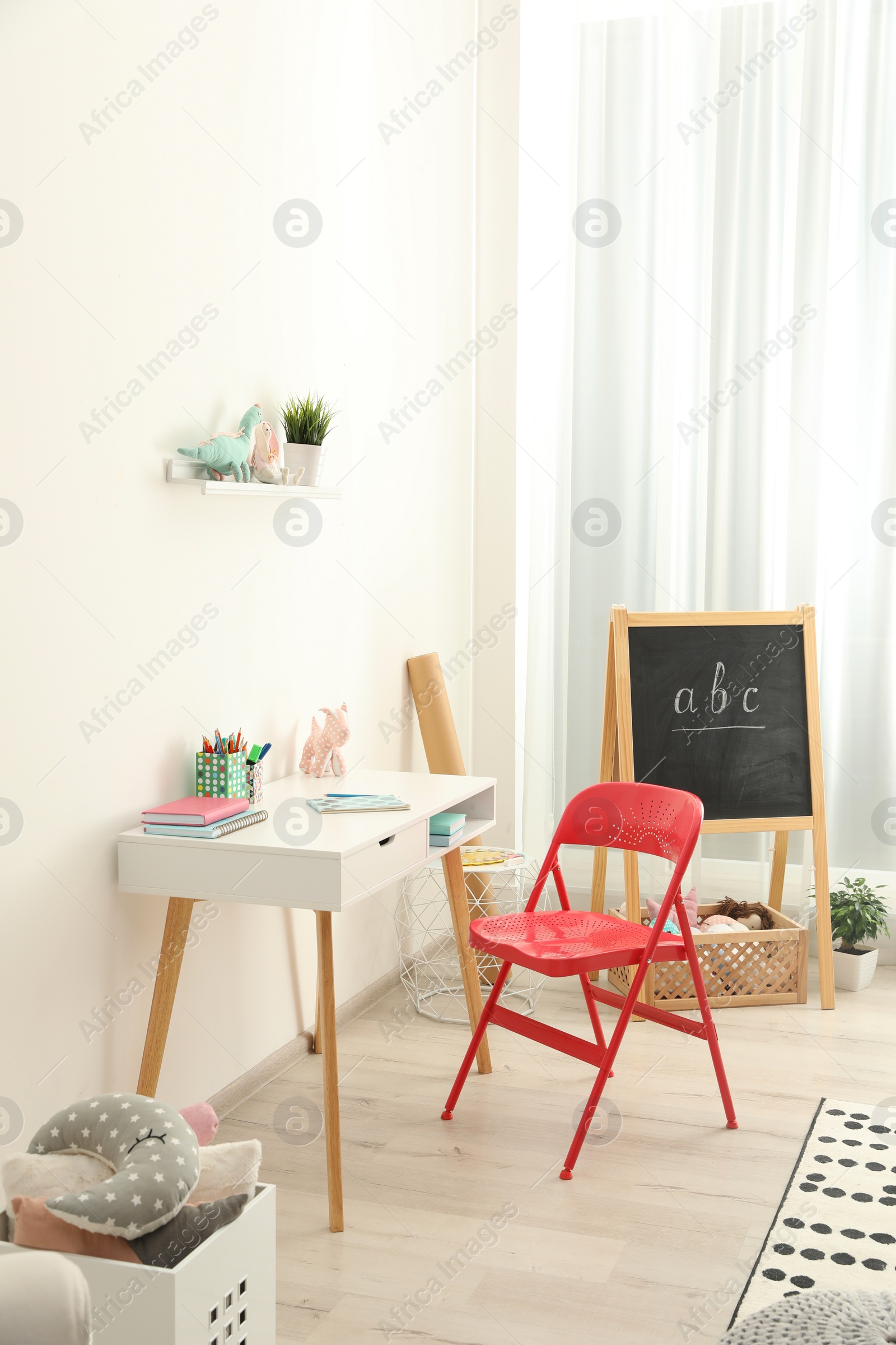 Photo of Modern child room interior with stylish furniture