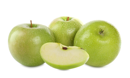 Image of Cut and whole green apples on white background