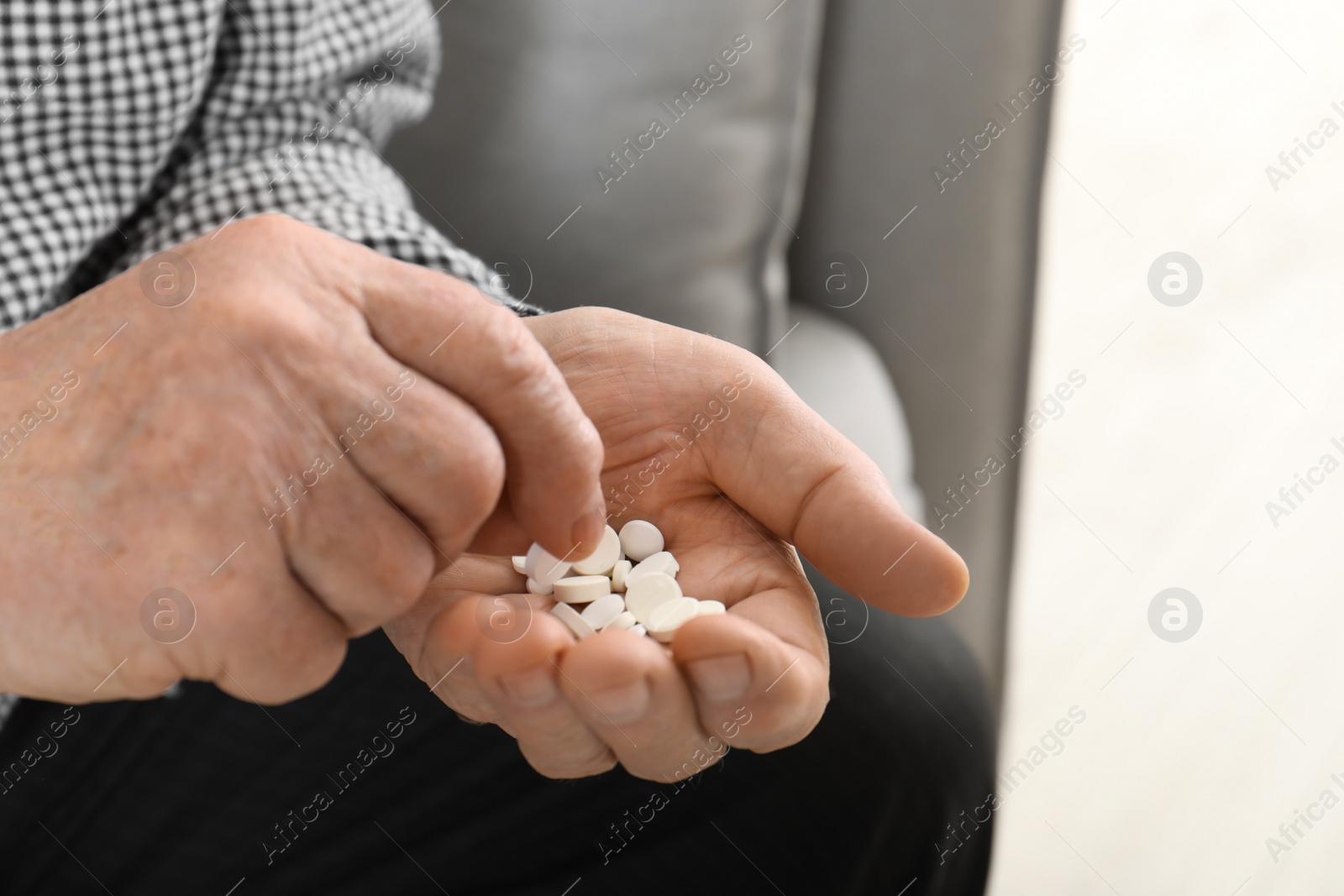 Photo of Senior man taking medicine, closeup. Health care