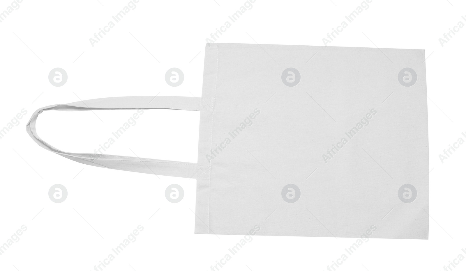 Photo of Blank beige textile bag on white background, top view. Mockup for design