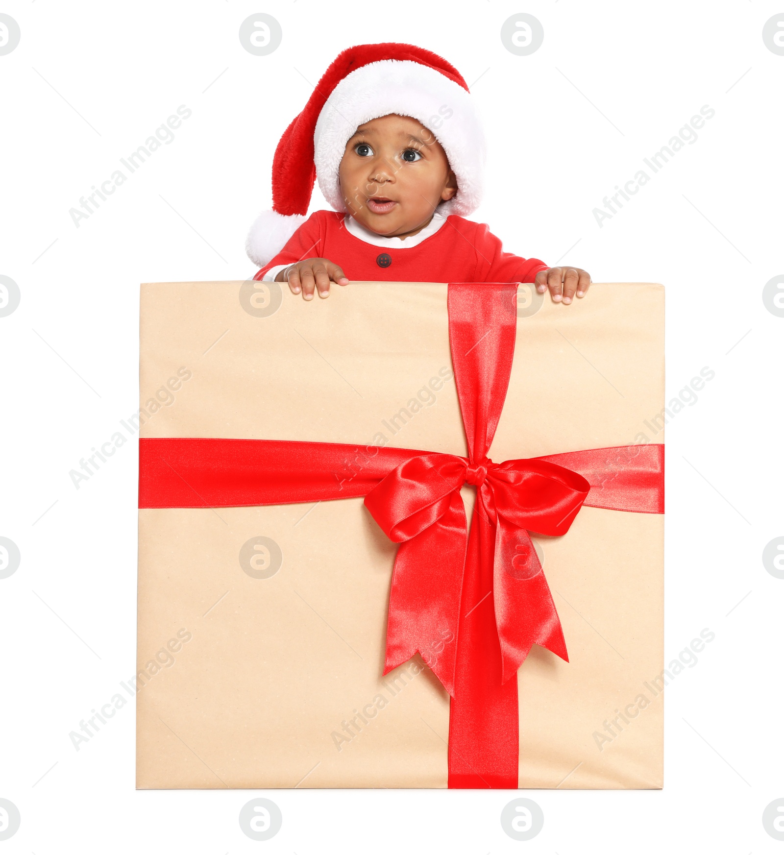 Photo of Festively dressed African-American baby in Christmas gift box on white background