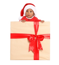 Festively dressed African-American baby in Christmas gift box on white background