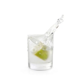 Photo of Shot of vodka with lime slice and splash isolated on white