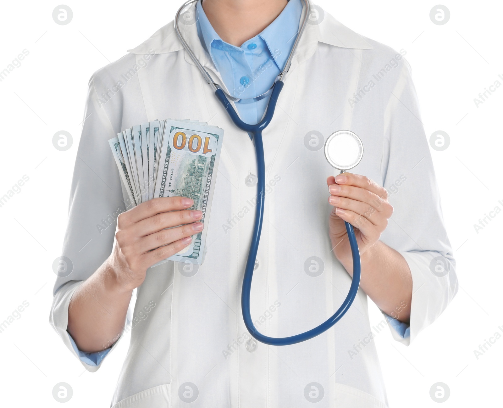 Photo of Doctor with bribe and stethoscope on white background, closeup. Corruption in medicine