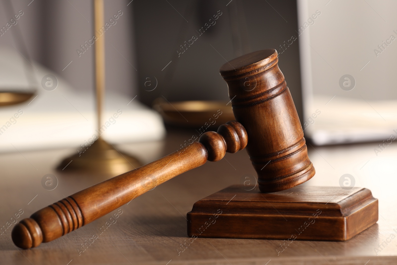 Photo of Law concept. Gavel on wooden table, closeup