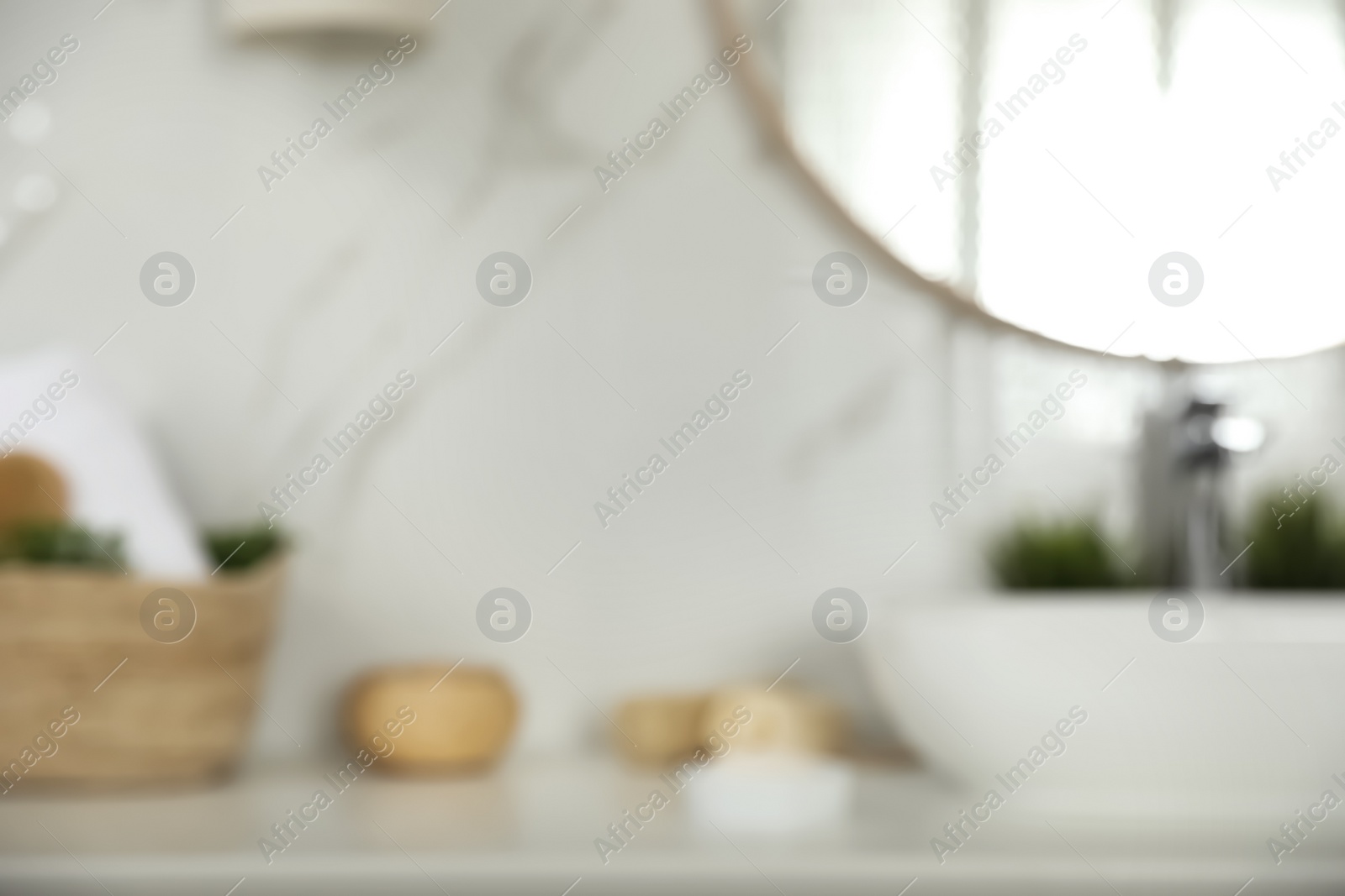 Photo of Blurred view of stylish modern bathroom with mirror