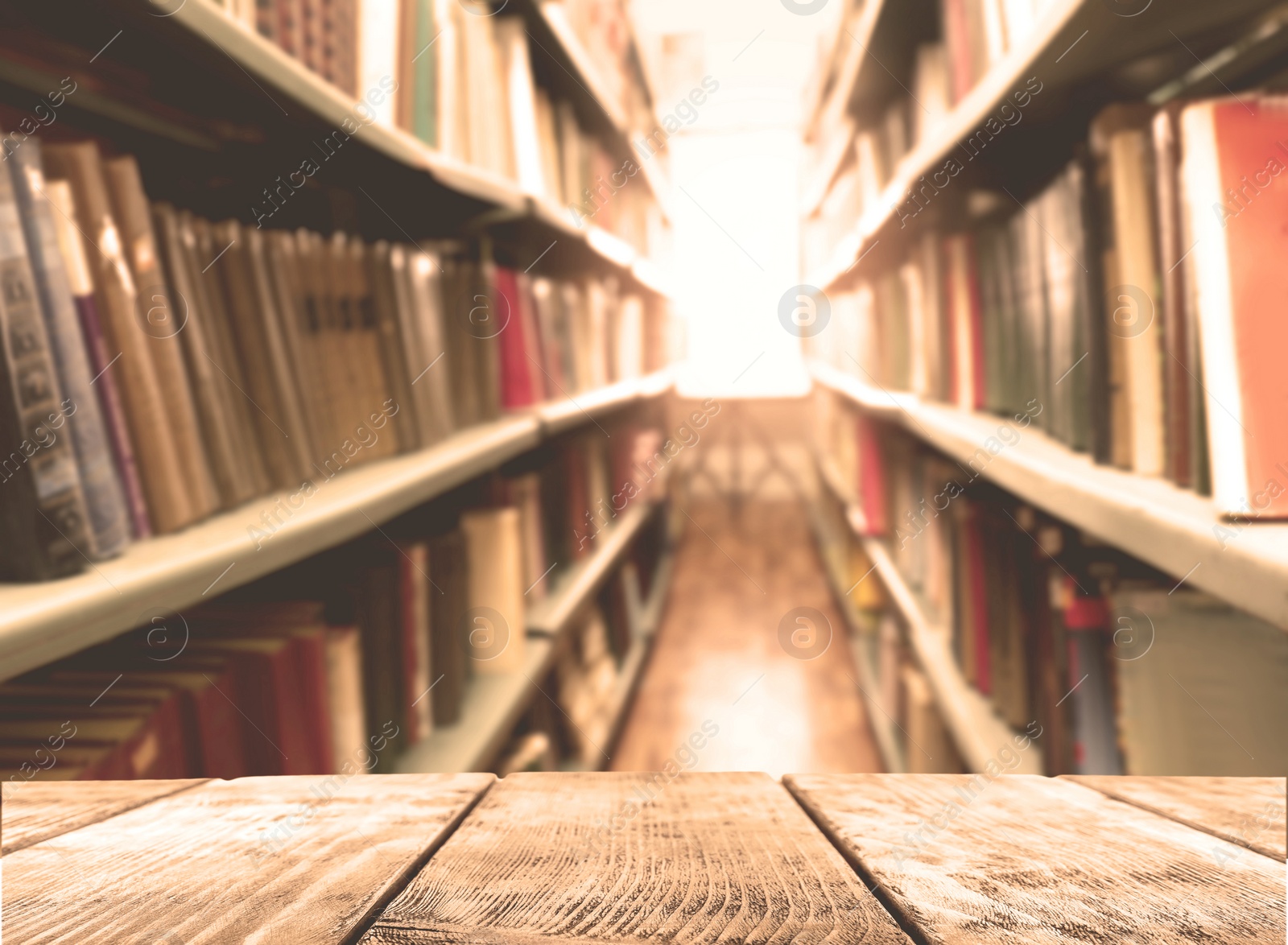 Image of Empty wooden table in library. Space for design 