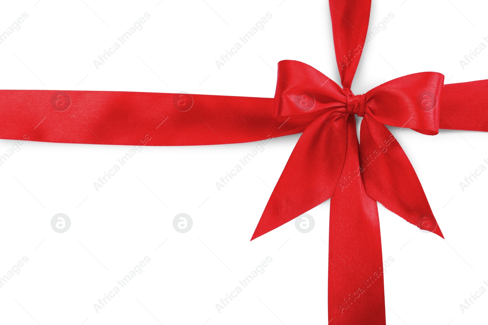 Photo of Red satin ribbons with bow on white background, top view