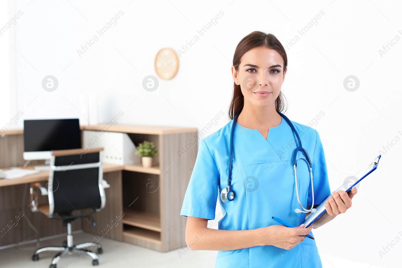 Photo of Female medical assistant in clinic. Health care service