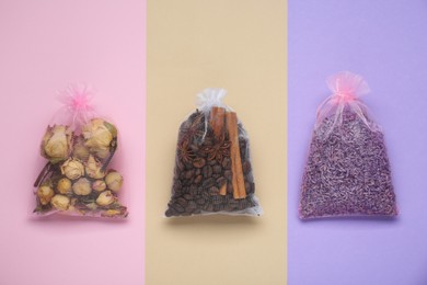 Scented sachets with dried flowers, coffee beans and spices on color background, flat lay