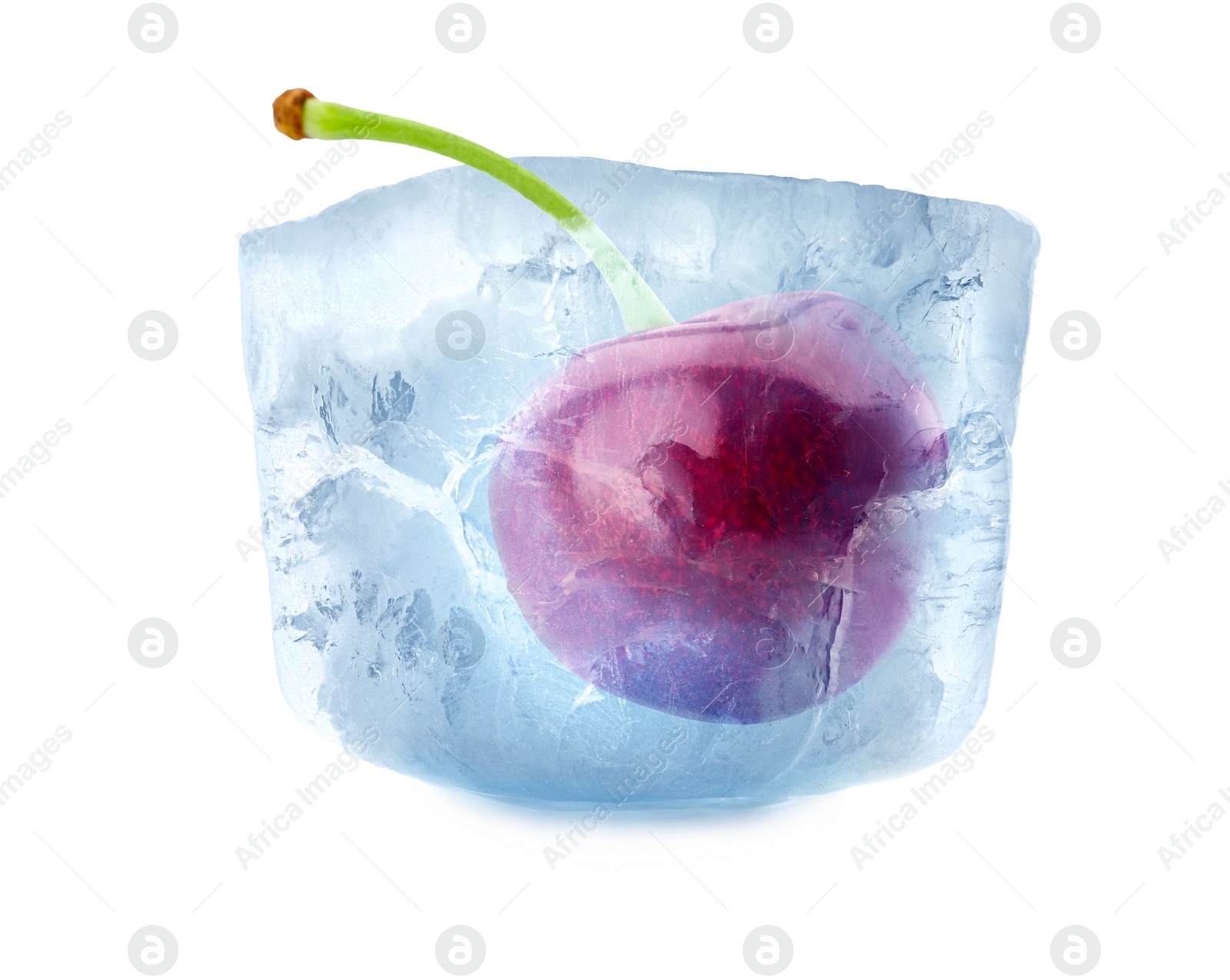 Image of Frozen food. Raw cherry in ice cube isolated on white