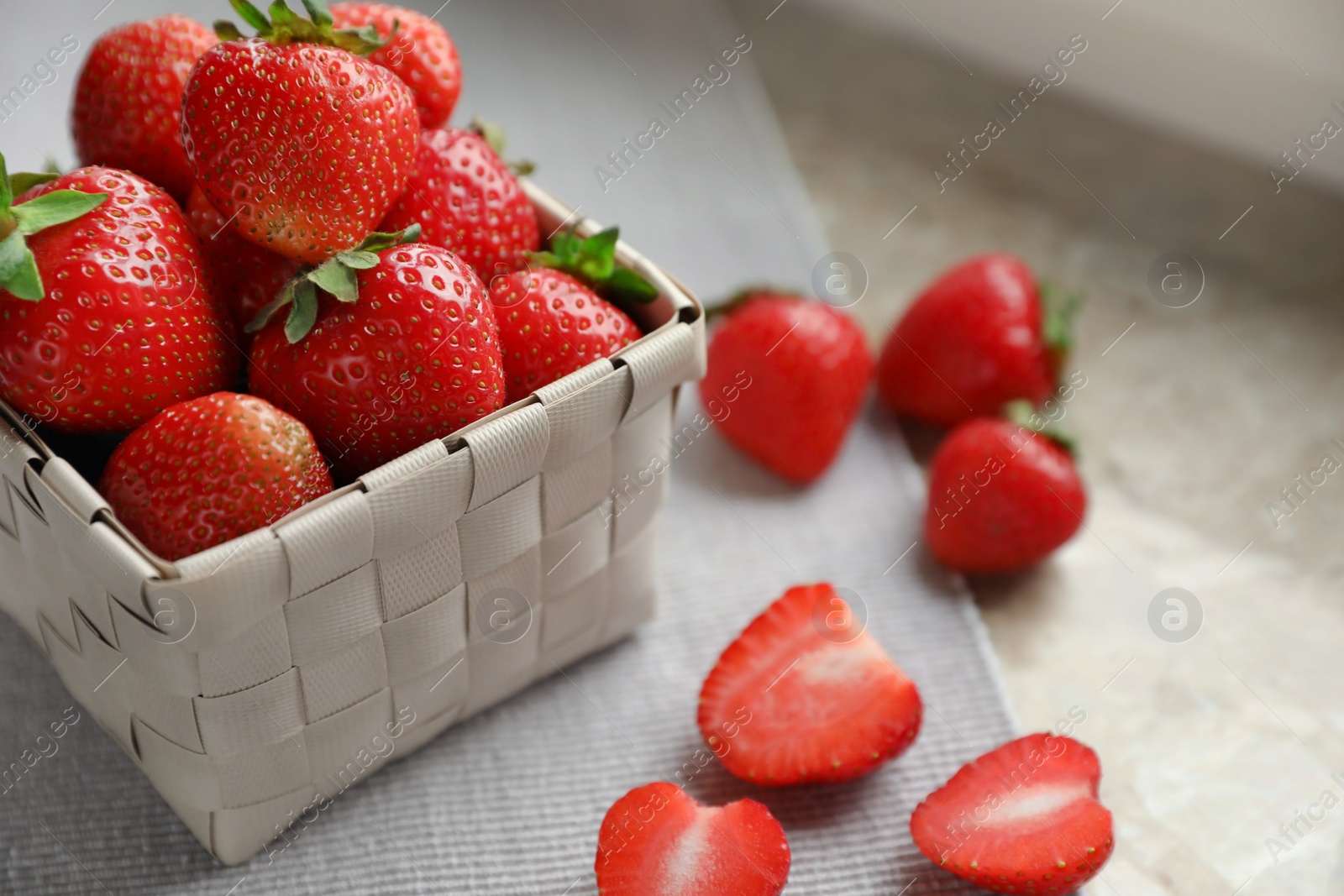 Photo of Fresh juicy strawberries on table, closeup. Space for text