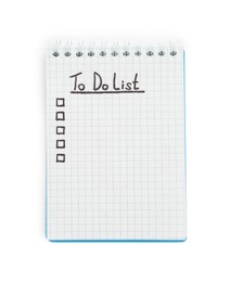 Notepad with unfilled To Do list and checkboxes on white table
