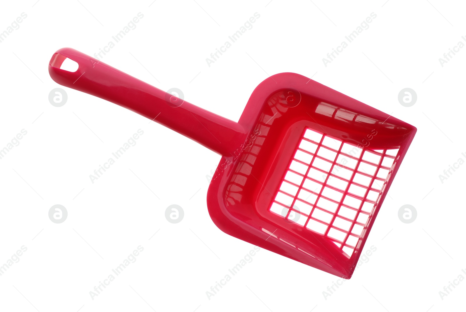 Photo of Red plastic scoop for cat litter isolated on white, top view