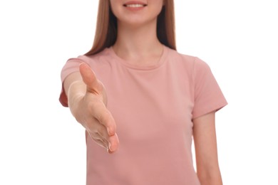 Photo of Woman welcoming and offering handshake on white background, closeup