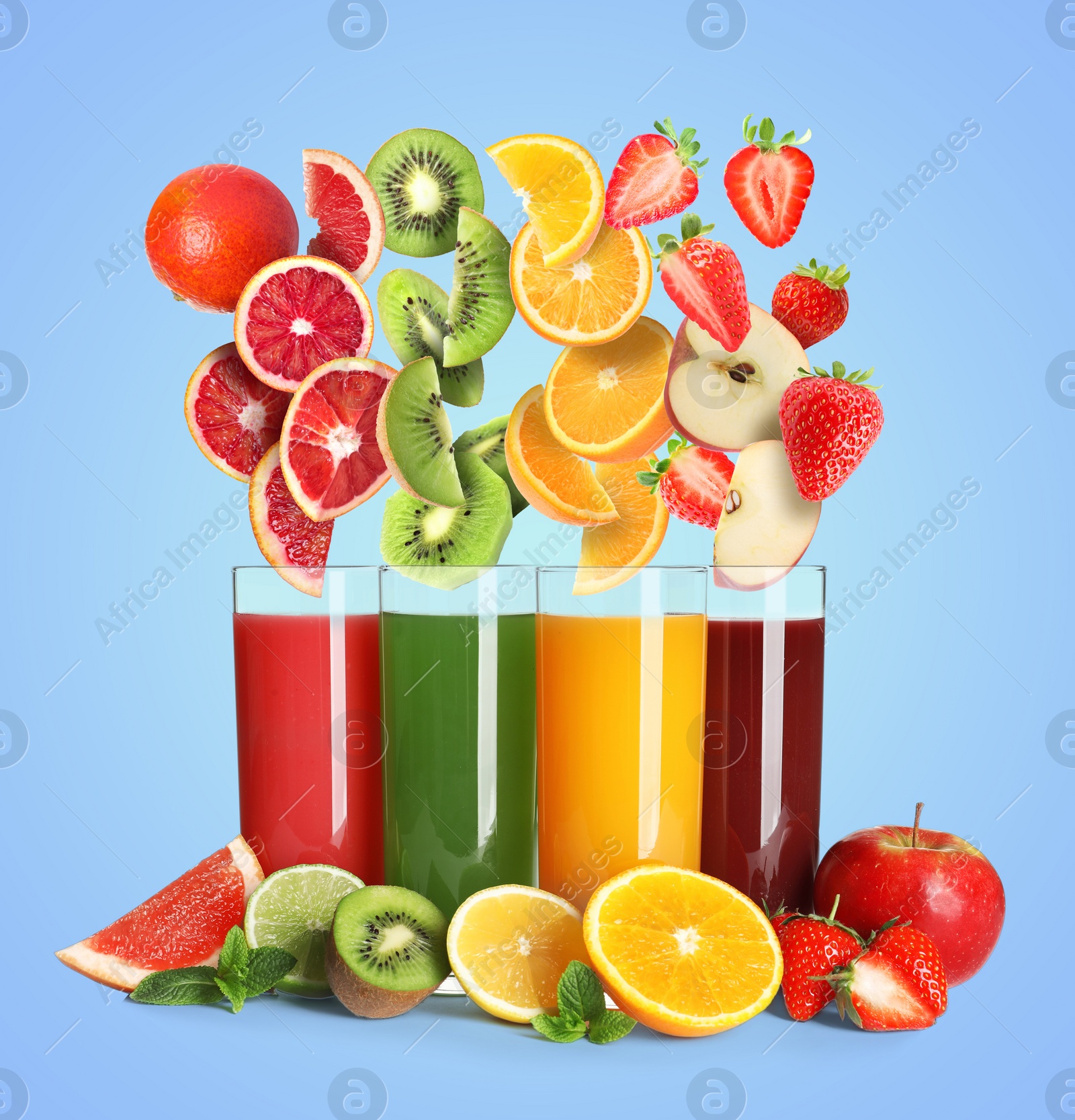 Image of Different types of juices and fresh fruits on light blue background