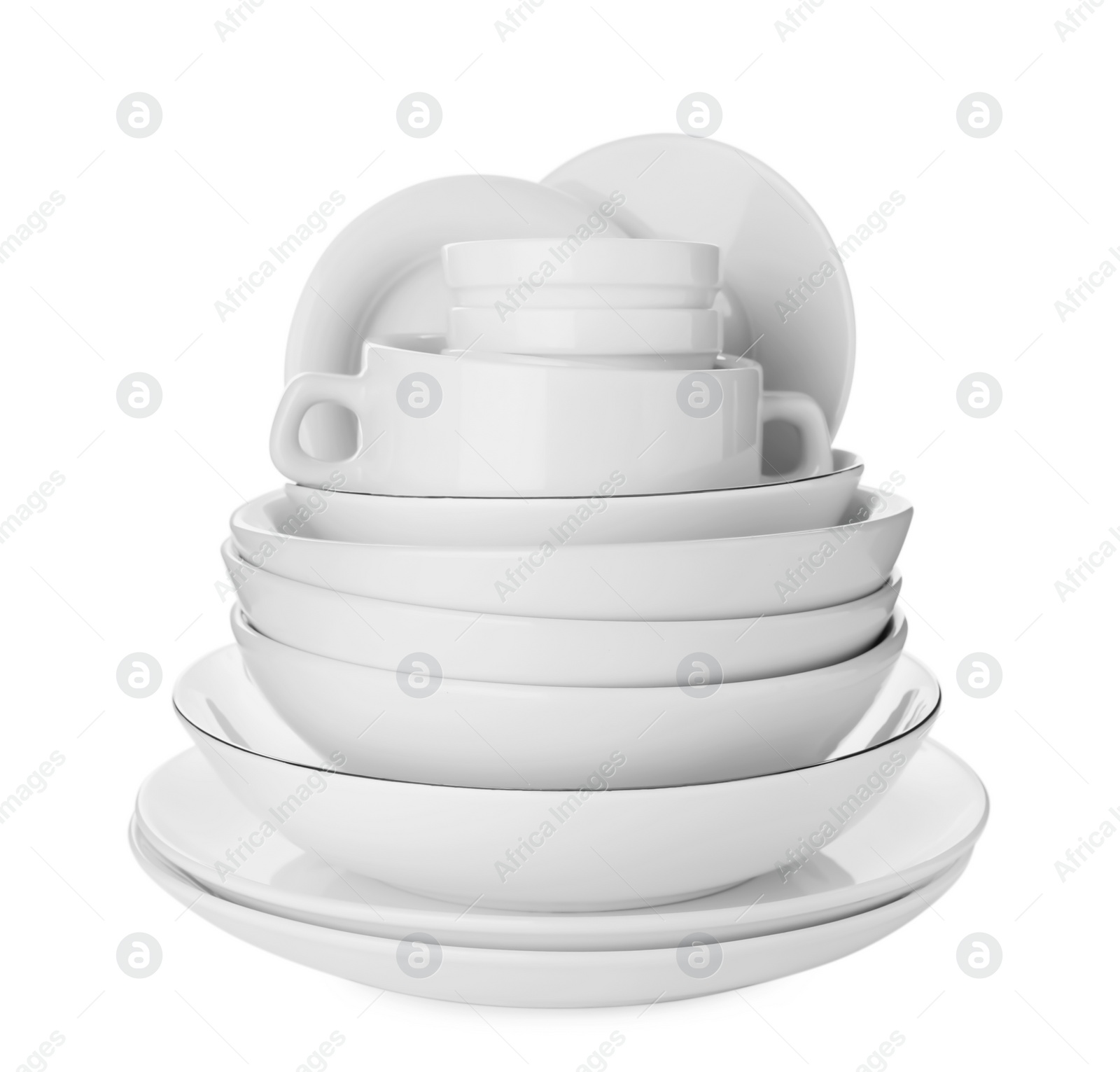 Photo of Set of clean dishes on white background