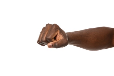 Photo of African-American man showing fist on white background, closeup